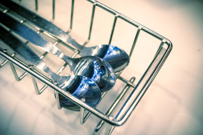 High angle view of rack with spoon in kitchen