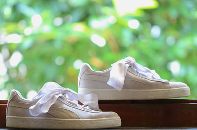 Close-up of shoes on table