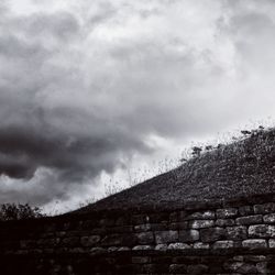 Building against cloudy sky