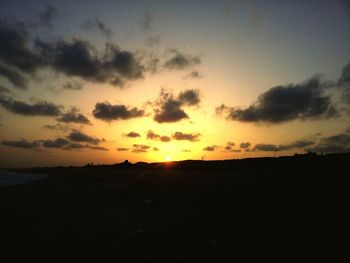 Scenic view of silhouette against sky during sunset