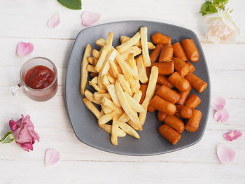 High angle view of vegetables in plate on table