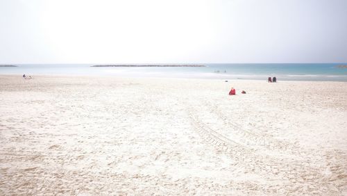 Scenic view of beach against clear sky