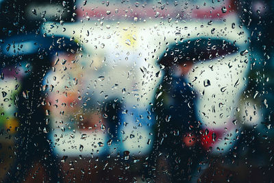 Raindrops on glass window during rainy season