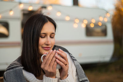 Young woman using phone