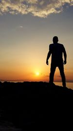 Silhouette of people at sunset