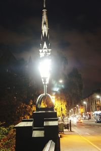 Illuminated street light at night