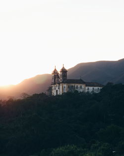 Building against sky during sunset