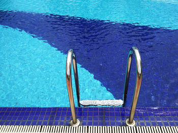 High angle view of railing in swimming pool