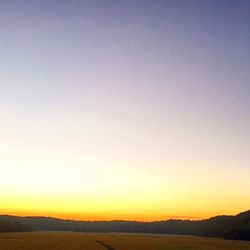 Scenic view of mountains at sunset