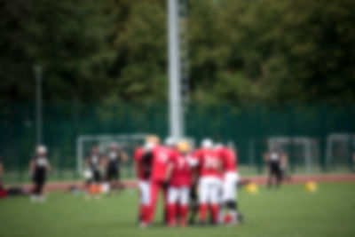 Group of people in soccer field
