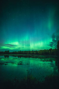 Scenic view of sea against sky at night