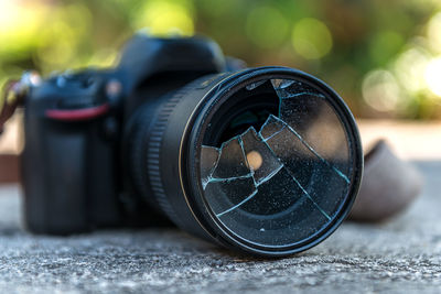 Close-up of camera on table