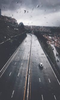 High angle view of road in city during rainy season