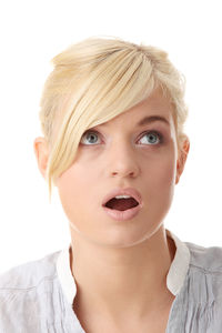 Portrait of a beautiful young woman over white background