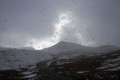 Scenic view of mountains in the snow