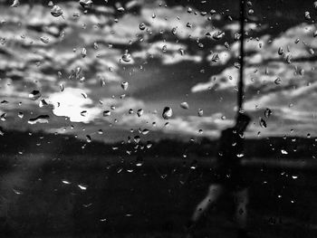 Full frame shot of wet window in rainy season