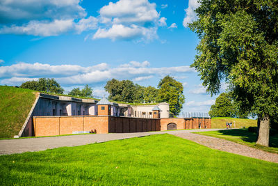 House on field against sky