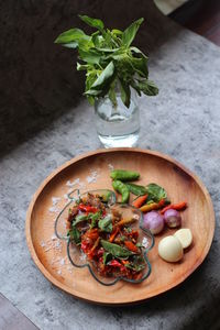 High angle view of fruit salad in bowl on table