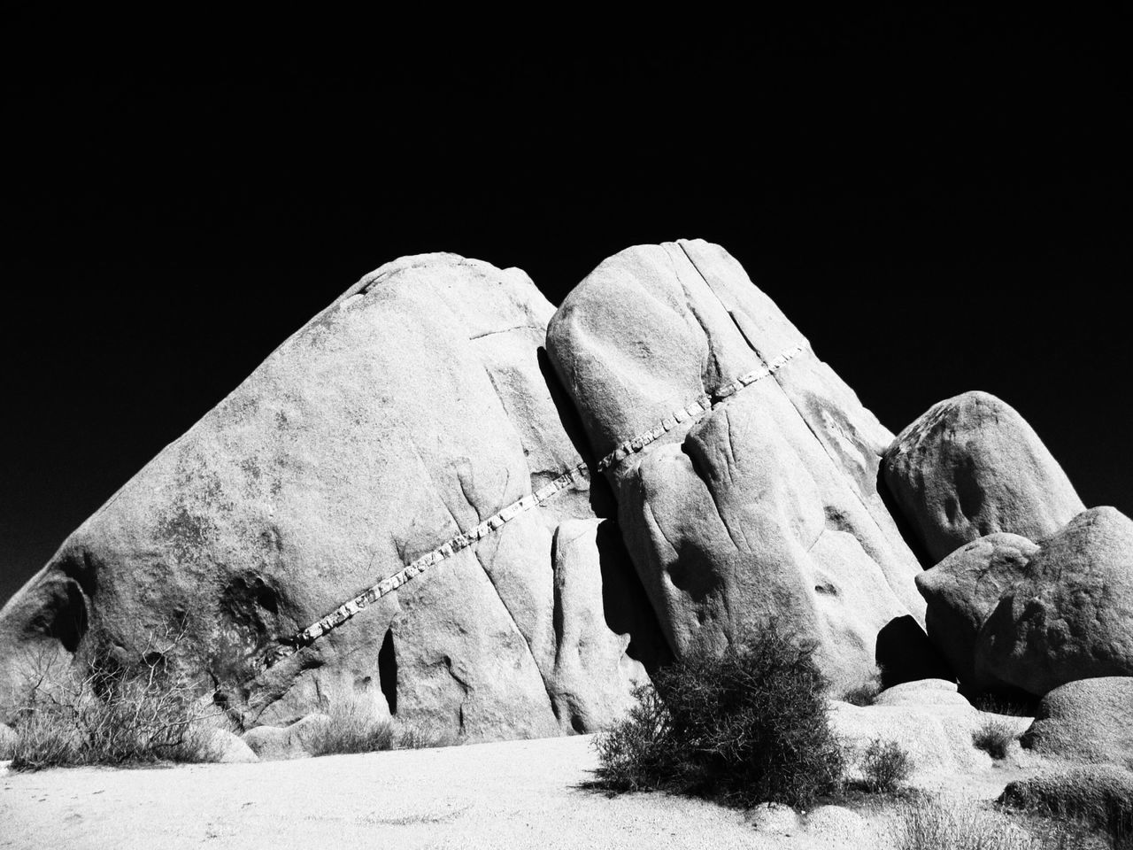 clear sky, copy space, low angle view, rock - object, rock formation, built structure, damaged, architecture, no people, outdoors, day, old, history, abandoned, ancient, nature, old ruin, stone, stone material, tranquility
