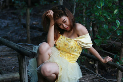 Young woman looking down