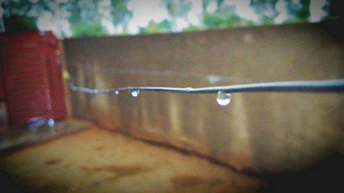 Close-up of water drops on glass