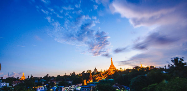 Panoramic view of city buildings against sky