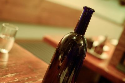 Close-up of beer bottle on table