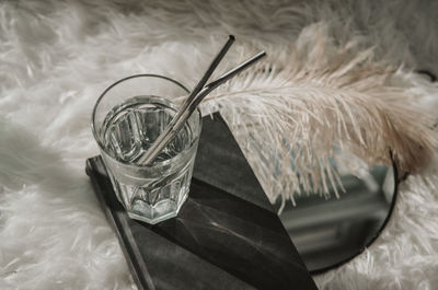 High angle view of glass jar on table