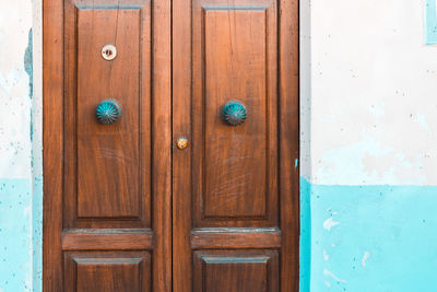 Closed wooden door of building