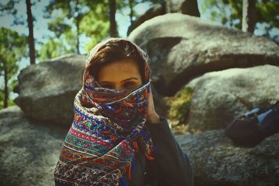 Woman standing on rock