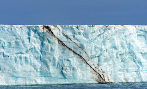 Face details on a massive tidal glacier on nordaustlendet in the svalbard islands