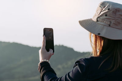 Woman using mobile phone