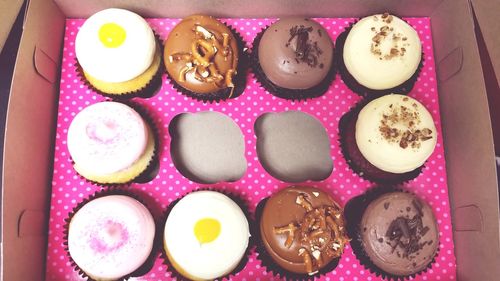 High angle view of various candies in box