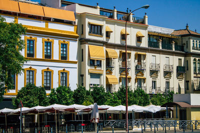 Residential buildings against sky in city