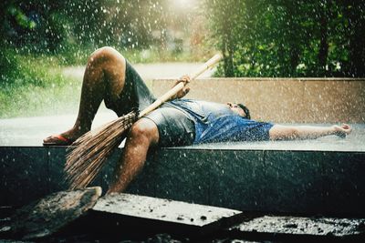 Man lying in boat