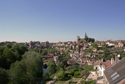 High angle shot of townscape against clear sky