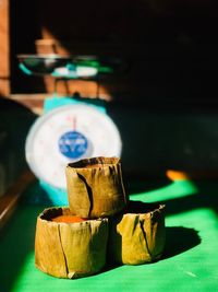 Close-up of illuminated candles on table