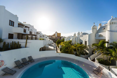 High angle view of swimming pool in city