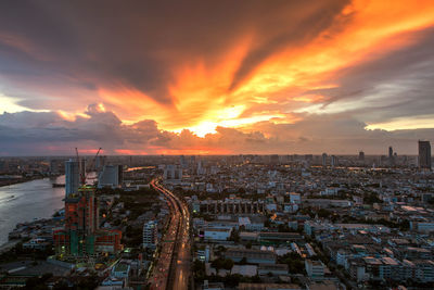 High angle view of city against sky during sunset