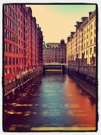 View of canal in city