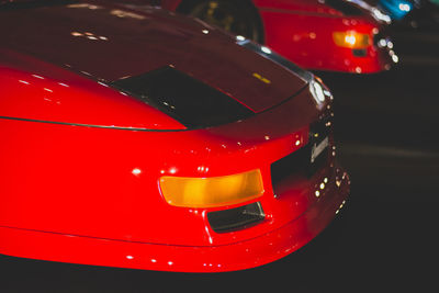 Close-up of red vintage car