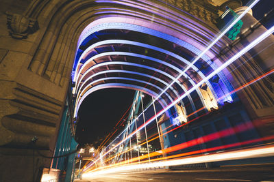 Trails of traffic lights on bridge