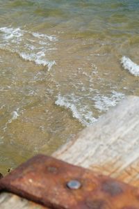 High angle view of wood on beach