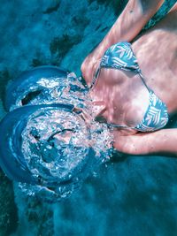 Woman blowing bubble undersea