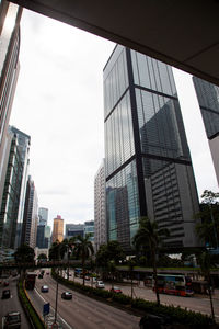 City street and modern buildings against sky