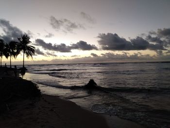 Scenic view of sea against sky at sunset