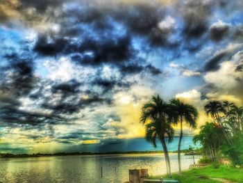 Scenic view of sea against sky at sunset