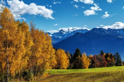 Scenic view of landscape against cloudy sky