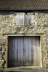 Low angle view of window of old building