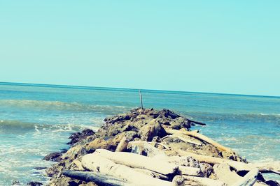 Scenic view of sea against clear sky